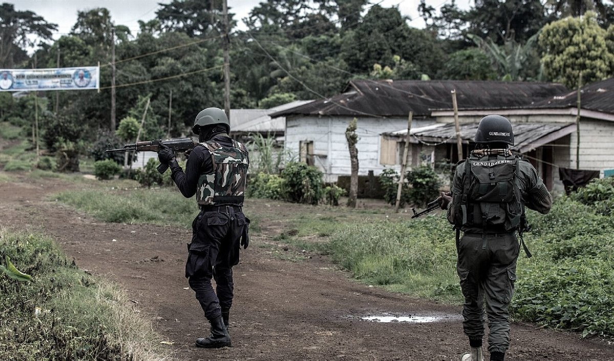 A security patrol walking along a quiet street